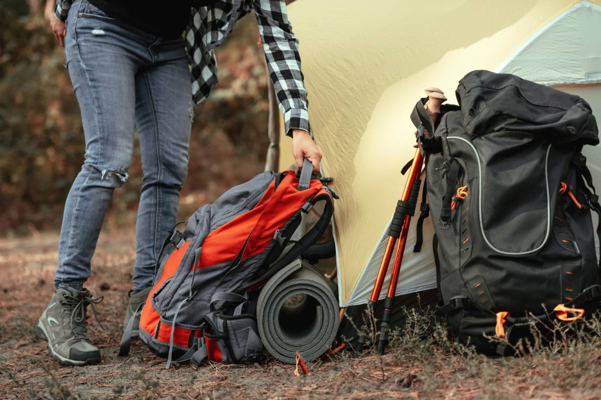 Backpack tourist travel hiking outdoor adventure use water stream from mountain washing hand