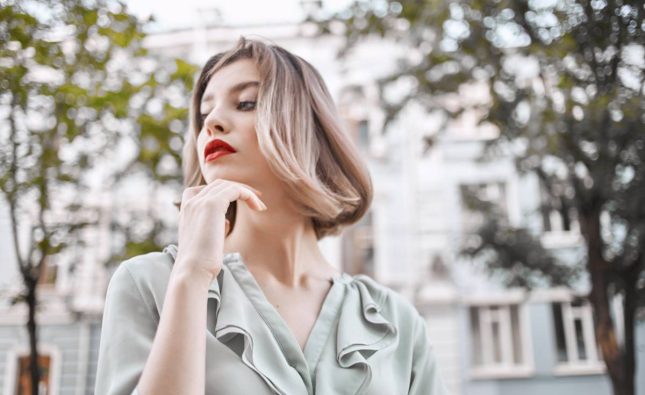beautiful blonde red lips walk outdoors lifestyle