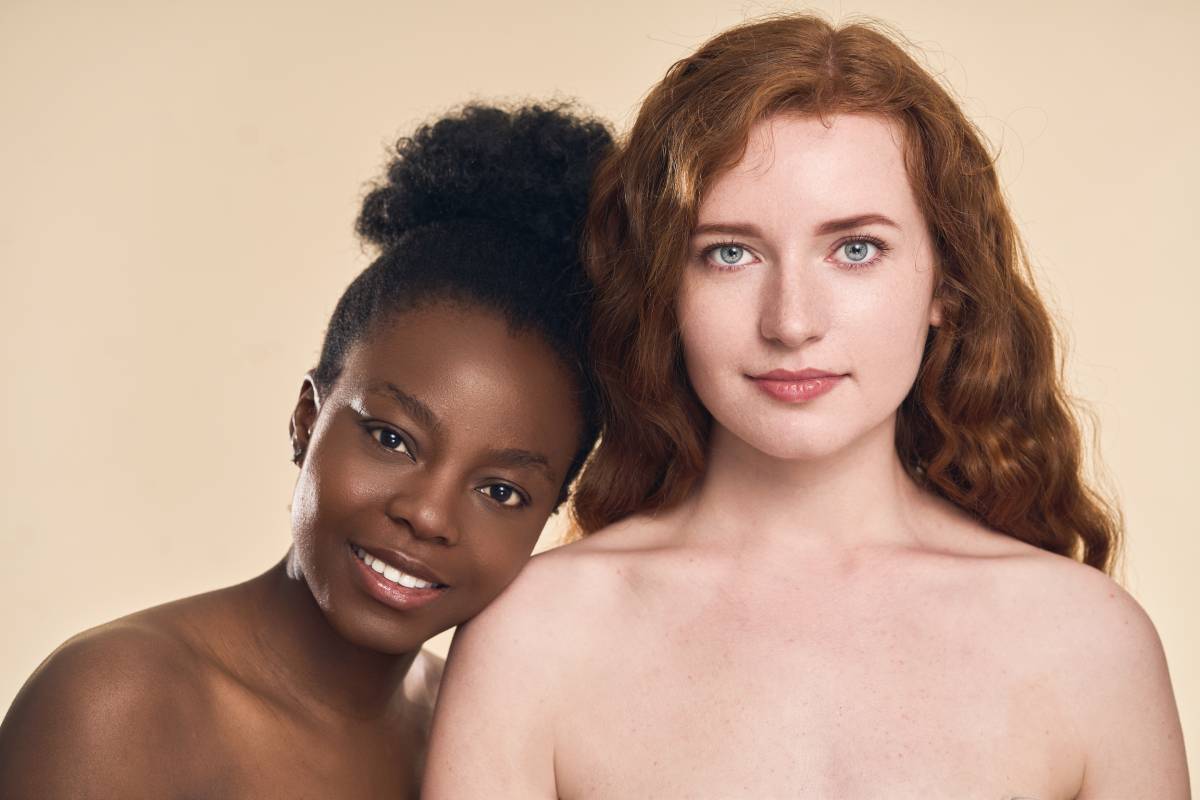 Diverse Women Embracing Natural Beauty and Friendship